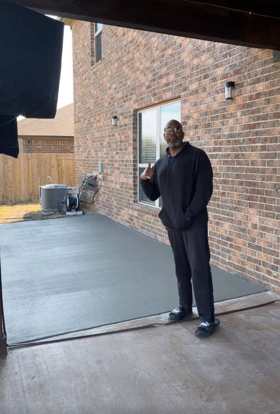 Satisfied customer with patio addition